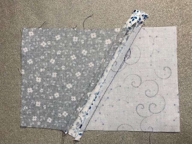 Ensrettet patchwork tæppe med pile