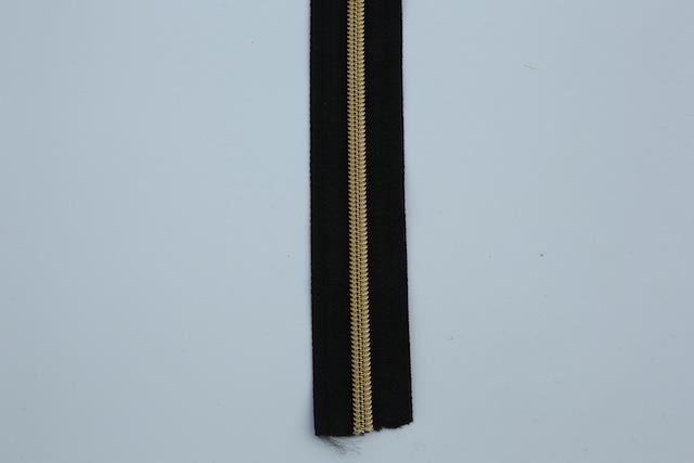 Sort 6 mm Lynlås i metermål med guld "tænder"