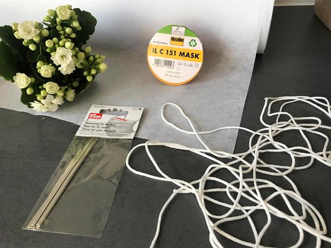 Sy selv mundbind der sidder godt ( synes jeg)