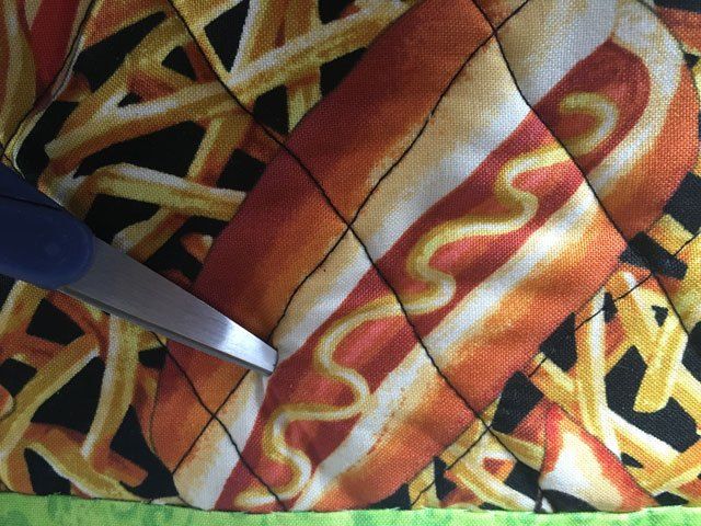 Grydelapper med guld ophængs hul