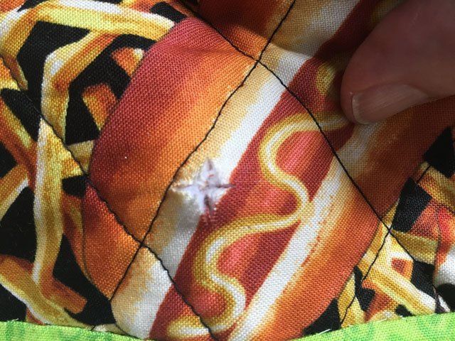 Grydelapper med guld ophængs hul