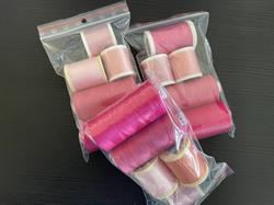 5 ruller sy/quiltetråd i samme farveskala lykkepose. Pink