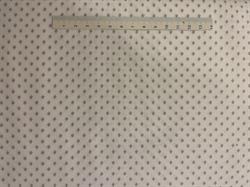 Lyst patchworkstof med grå romber