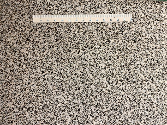 Beige patchworkstof med blå grene