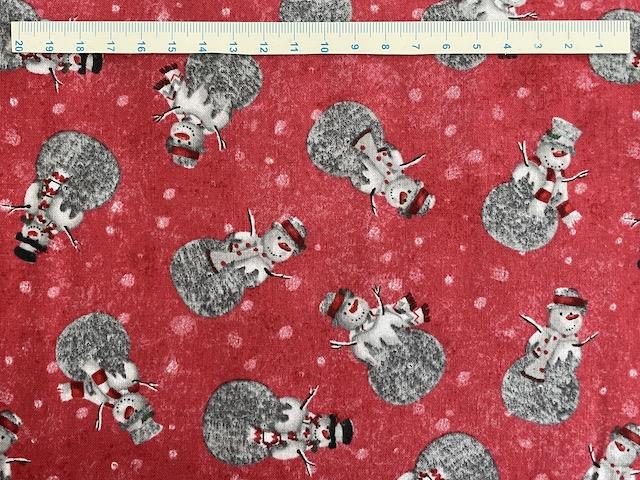 Røde patchworkstof med runde snemænd