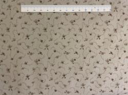 Beige patchworkstof med mønster