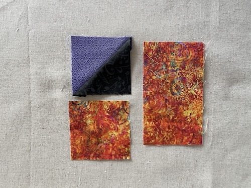 Strimler med trekanter er smukt Holte restetæppe