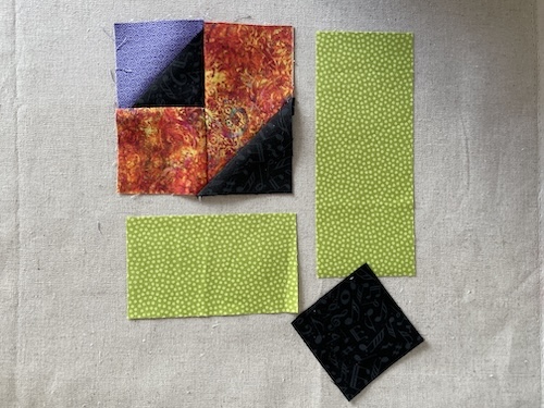 Strimler med trekanter er smukt Holte restetæppe