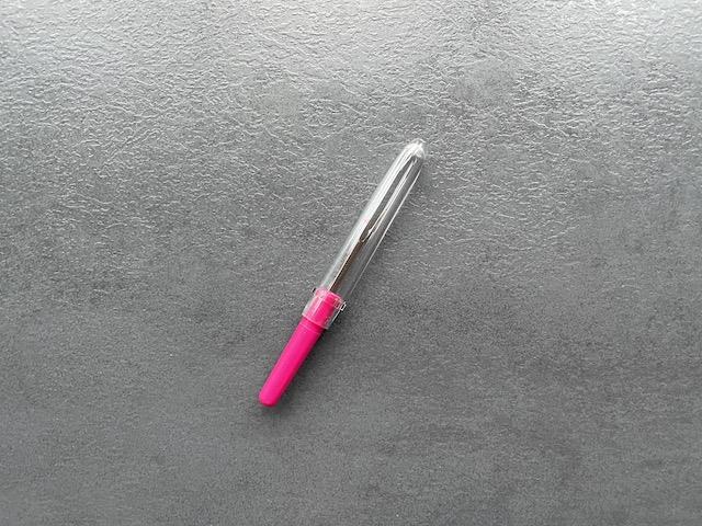 pink opsprætter med hætte – smart og effektiv til præcist syarbejde