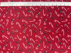 Sukkerstokker på brede rød bomuldsstof 