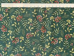 Gren og bær på bred grøn bomuldsstof 