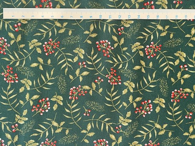 Gren og bær på bred grøn bomuldsstof 