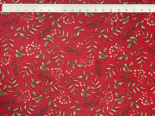 Grene og bær på bred rød bomuldsstof 