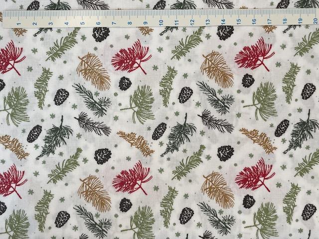 Kogler og grene på bred hvid bomuldsstof 