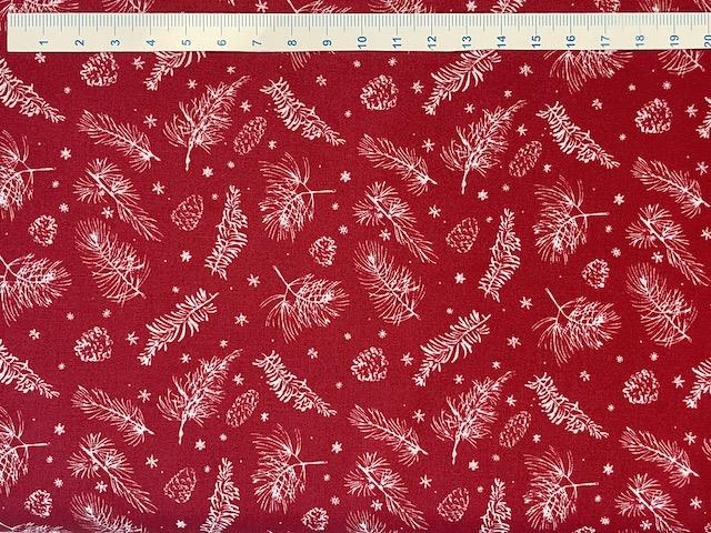 Kogler og grene på bred rød bomuldsstof 