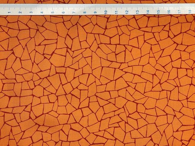 Orange patchworkstof - med net mønster