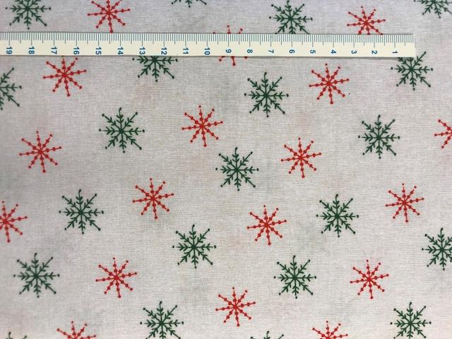 Lys patchworkstof med iskrystaller