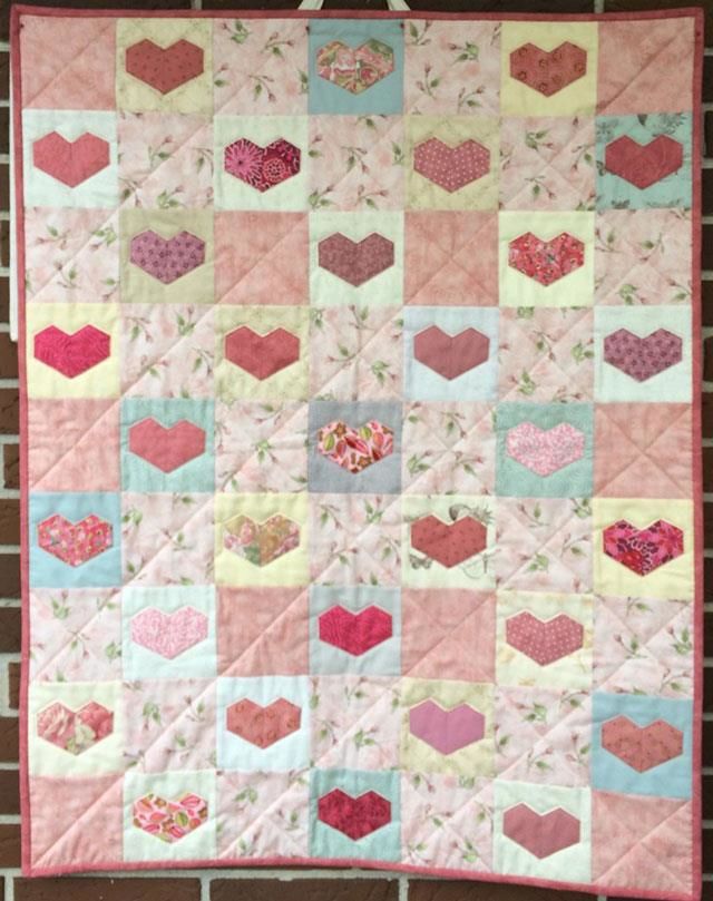 Jyttes HIT hjerte tæppe med applikeret hjerter