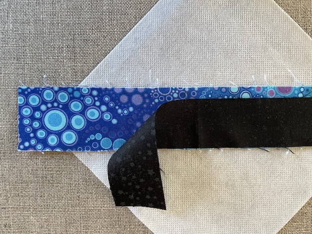 Stribet trekanter i Rønne Restetæppe