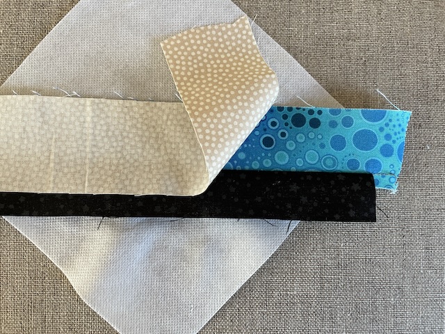 Stribet trekanter i Rønne Restetæppe