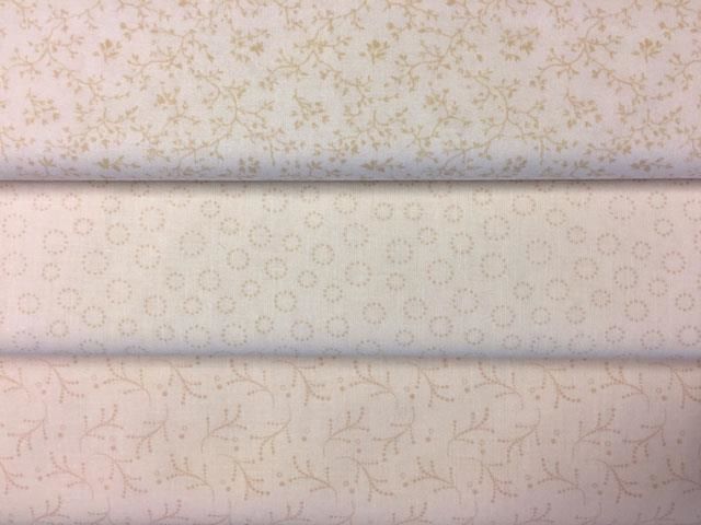 Cremefarvet Patchworkstof med lille mønster